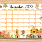 A Calendar With An Image Of Autumn And Fall Items On It Next To Pencils